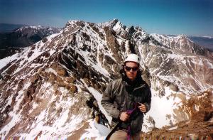 on top of Peak 11,967 with Idaho and Borah in the background